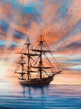 A n electric moment of  beautiful oldFrigate tall ship silhouetted by a dramatic sunset  of reds and oranges with hues of purple soft clouds running through bursting sun rays with a calm glassy ocean in foreground full of purple and blue hues 