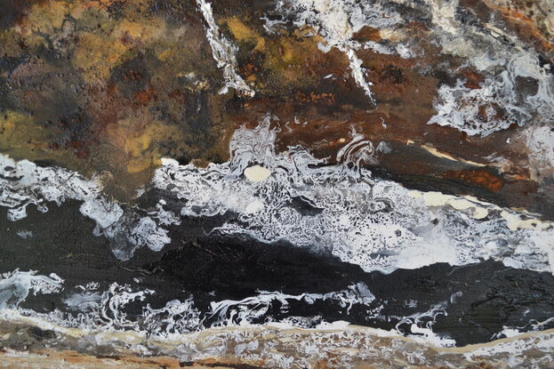 Earthy, dark tones of natural rock formations.