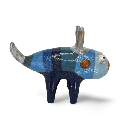 Here is a friendly little ceramic bug featuring a range of rich blue glazes.