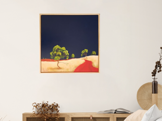 Australian landscape with dark blue sky and gold and beige highlighted hills and foreground, an orange red road leads out of the painting with trees scattered throughout,  Lucinda Leveille, original artwork, framed, Australiana