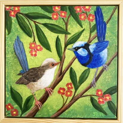 Two blue wrens, a male and a female, sitting in a tree surrounded by leaves and orange flowers. The background is a yellow-greenish colour which contrasts nicely with the blue of the birds and the orange flowers. The colour is wrapped around the sides of the canvas.