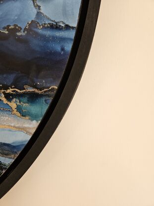 60cm round seascape of blues and green shades with quality black floating frame. 