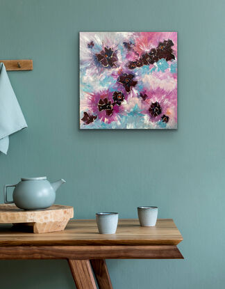 Soft blue green shades with fresh pink and deep maroon flower like motifs that are splashed across the canvas with energy and movement. This is a piece for your eye to explore and enjoy. 