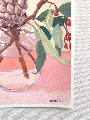 Protea and gum flowers in vase on pink background