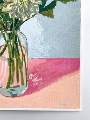 White and pink flowers in glass vase