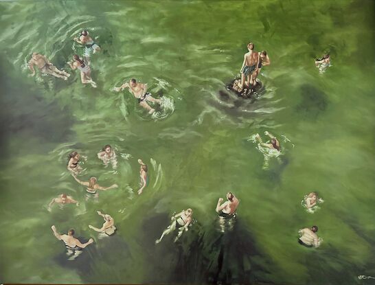 People at the beach swimming in green water