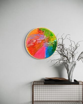 A circle shaped canvas with raw pine frame. 
A smaller artwork full of colour and neon brights. Bring joy to any room with this artwork. 