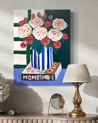 A home book with beautiful rose in the blue and white vase. 