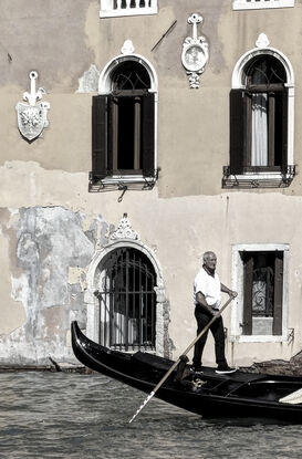 Inviting reflection on canal in Venice, Italy