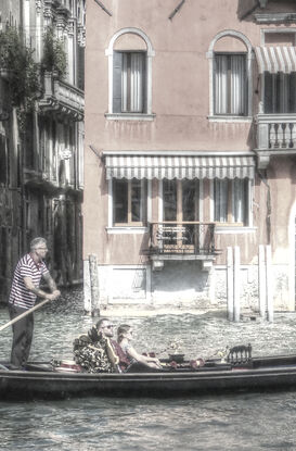 Inviting reflection on canal in Venice, Italy