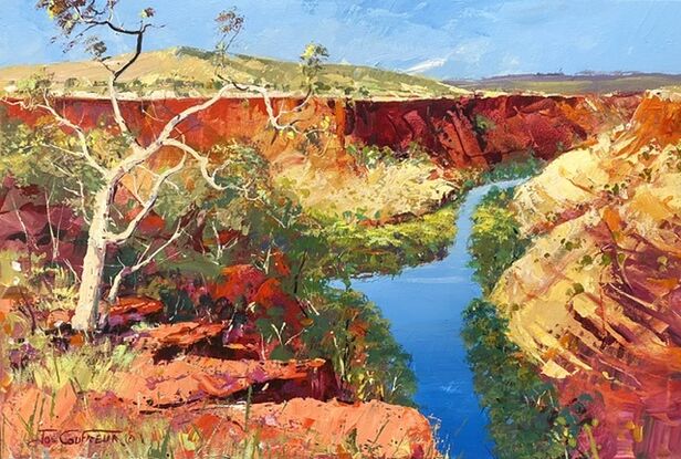 Dales Gorge in Karijini painted in vibrant colours with white gumtree standing out against the red rocks. 