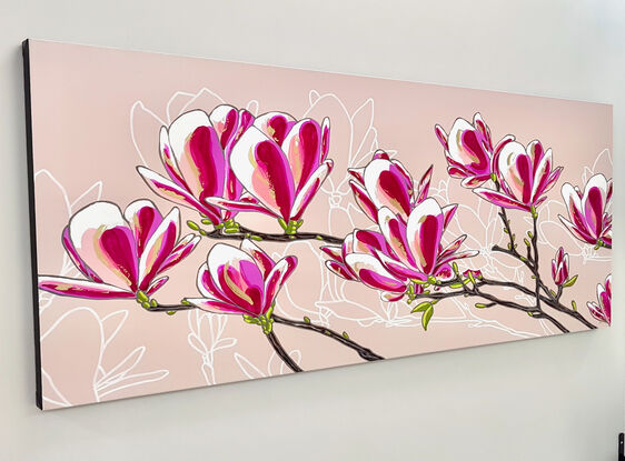 Pink magnolia branch with beautiful blossoms 