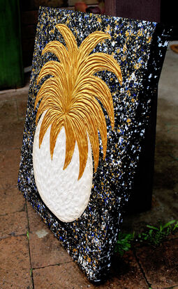 textured gold and white textured pineapple on a starry black background 