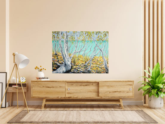 The bright blue water can be seen through the gum trees. On the forest floor are grasses. The strong light pouring into the scene illuminates the gum leaves. These have been painted in gold and change as the light in your room changes.