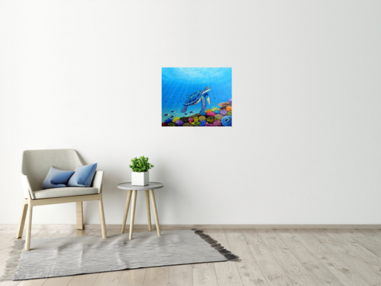 A blue green sea turtle swimming over a multi-coloured coral reef with sunlight shining down through the water. The coral is yellow, blue, purple and pink coloured with green and pink parrot fish and clown fish and other small tropical fish swimming over the reef.