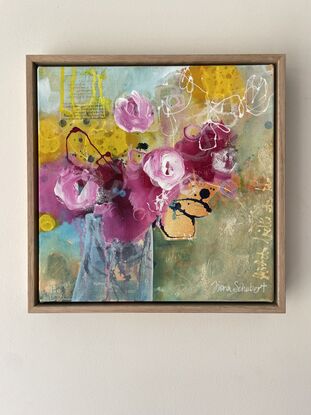 Sage green and pale aqua colours fill the background with pink and yellow coloured abstract blooms with dark blue and magenta fine line ink work leaf-like shapes. The blooms are in a stylised transparent vase. 