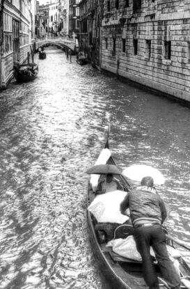 Inviting reflection on canal in Venice, Italy