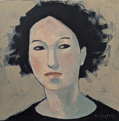 A simple beige background draws the focus onto the face of "Casandra". The dark haired woman is looking off to the side or perhaps behind the viewer. 