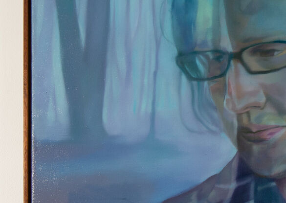 The artwork is a double exposure image of a man wearing glasses in a shirt, superimposed with an image of a forest. Through this juxtaposition, I aim to convey the interconnectedness of human beings and nature. The use of muted blue tones in the oil painting creates a sense of calm and introspection, inviting the viewer to contemplate their own relationship with the environment.