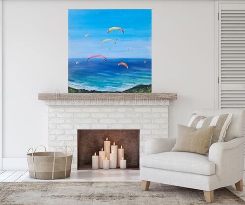 Colourful Paragliders brightly light  a peaceful blue sky, #paragliders soaring High, sailing through a smooth clear blue sky with a #peaceful clear blue ocean greeting them from below.