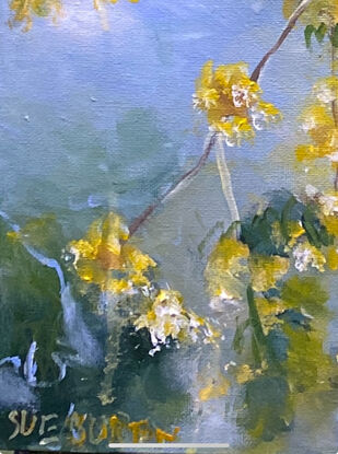 Golden cascades of wattle flowers against a soft blue sky and scattered green leaves. How dreamy. There is a soft misty blue background  sky and a feast of green leaves and glorious golden flowers that cascade down the canvas. This painting is alive with drama and you will be imagining the hum of bees and look at it over and over again as you drink in the beauty of this one. 