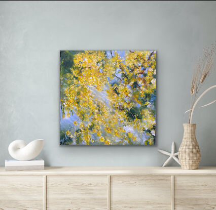 Golden cascades of wattle flowers against a soft blue sky and scattered green leaves. How dreamy. There is a soft misty blue background  sky and a feast of green leaves and glorious golden flowers that cascade down the canvas. This painting is alive with drama and you will be imagining the hum of bees and look at it over and over again as you drink in the beauty of this one. 