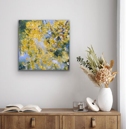 Golden cascades of wattle flowers against a soft blue sky and scattered green leaves. How dreamy. There is a soft misty blue background  sky and a feast of green leaves and glorious golden flowers that cascade down the canvas. This painting is alive with drama and you will be imagining the hum of bees and look at it over and over again as you drink in the beauty of this one. 