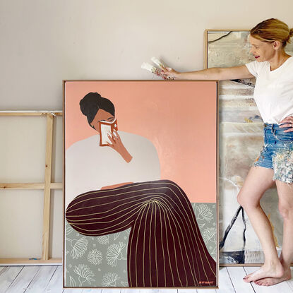 Beige background, woman reading book