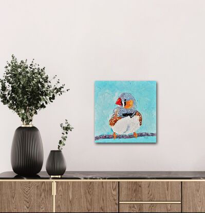 Textured palette knife oil painting of a small native Australian bird, the Zebra Finch. The bird is on a perch and the background is painted a textured turquoise blue.