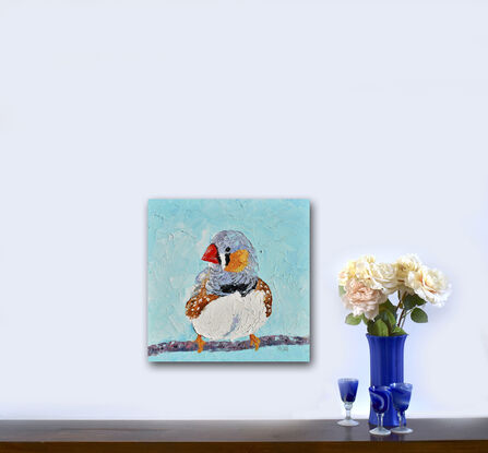 Textured palette knife oil painting of a small native Australian bird, the Zebra Finch. The bird is on a perch and the background is painted a textured turquoise blue.