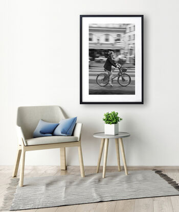 Black and white photograph of narrow street in Paris, France