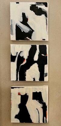 Three pieces black and white with orange.  Each piece  20 x 20 relates to each other and overall creates one art work.