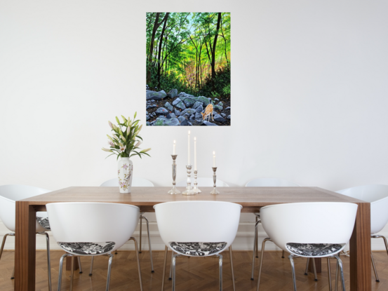 The artwork shows the Sill branch Falls area in Tennessee. Lots of rocks with a small pool created by the water from the fall. A deer is seen taking a drink of this refreshing water.