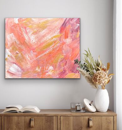 Large brushstrokes of gold, pink & purple with paint splatters in white & pink