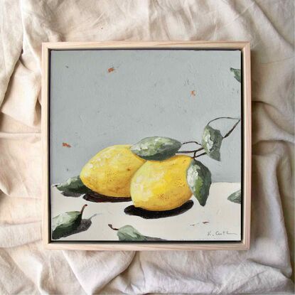 Small original textured still life  painting of two lemons on a light grey and cream  background