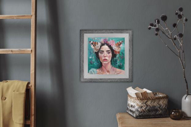 Woman against an emerald background,  with flowers and butterflies in her hair