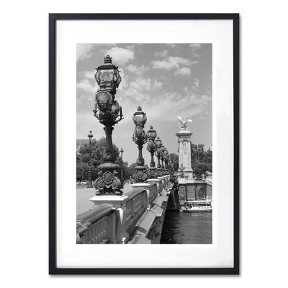 Black and white photograph of narrow street in Paris, France