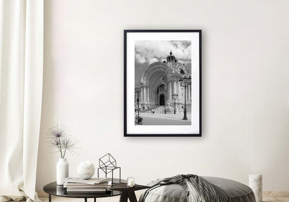 Black and white photograph of narrow street in Paris, France