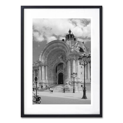 Black and white photograph of narrow street in Paris, France