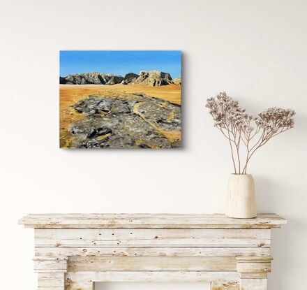 Bright, desert landscape. Hills and rocky.