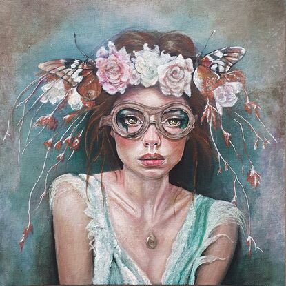 Woman with flowers and butterflies and steampunk goggles