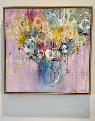 A mostly pale pink background with subtle under layers of drips is a happy background to the abstract expressionism, base of flowers in colours of pink, red,  yellow and white with some dark grey, gritty detailing. 