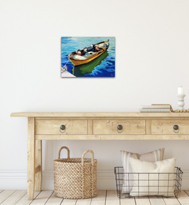 Wooden boat docked and floating on the water.