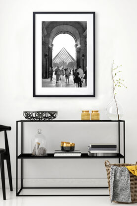 Black and white photograph of narrow street in Paris, France