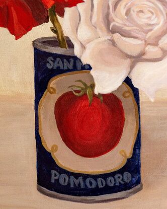 A vintage tomato tin is an unusual vase for a red & a white rose. Deep navy blue compliments to rich red of the rose.