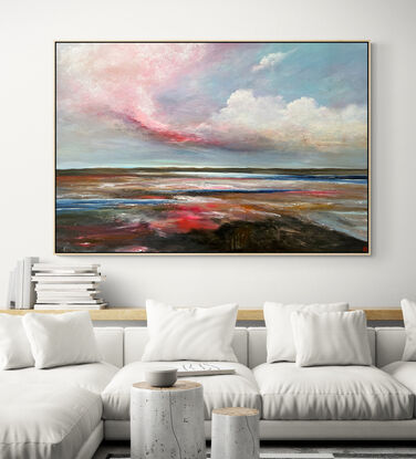 Colourful Textured landscape with fluffy vibrant hot pink, white and blue fluffy clouds above a sunset filled landscape with blue water flowing through.