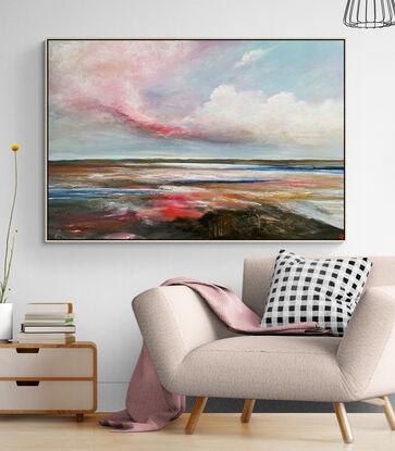 Colourful Textured landscape with fluffy vibrant hot pink, white and blue fluffy clouds above a sunset filled landscape with blue water flowing through.