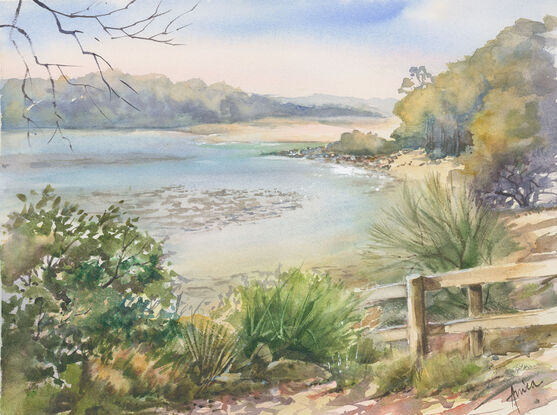 A peacefully serene scene of Narrawallee inlet with the water at half tide, timber steps in the left hand corner and vegetation in the foreground.