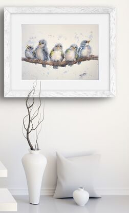 Five blue birds on a branch
Fluffy birds
Young birds on a branch