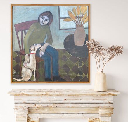 The painting depicts a girl sitting on an armchair. There is a white dog beside her and he has his face on her lap. There is a table with a vase of flowers beside her. 